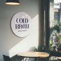 Okrągły Szyld z Twoim Logo biały mleczny akryl - Szyld reklamowy z plexi - 40 cm